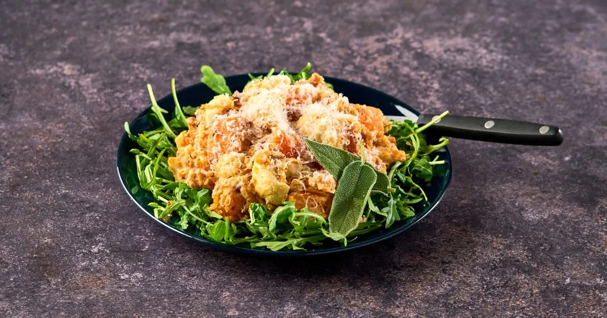 Gebakken bloemkool en pompoen met Parmezaan en spekjes