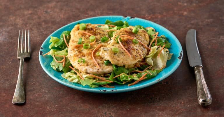 Parmezaanse kipschnitzel met botersla